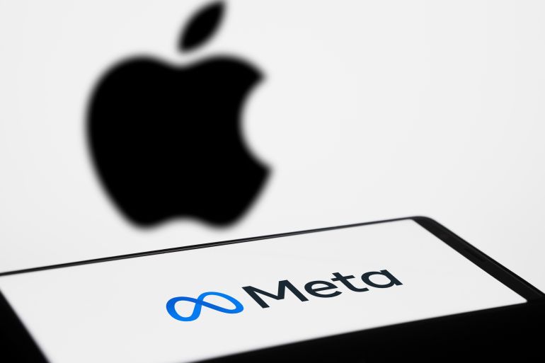 Dhaka, Bangladesh - 04 Februrary 2024: Meta logo displayed on smartphone and Apple logo on background.